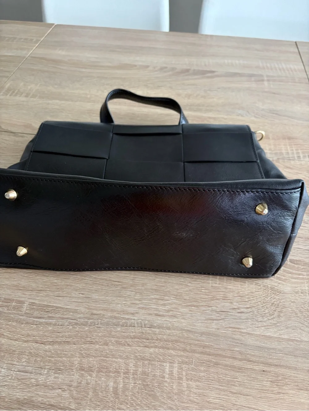 Structured Black Leather Top-Handle Satchel with Woven Flap Detail